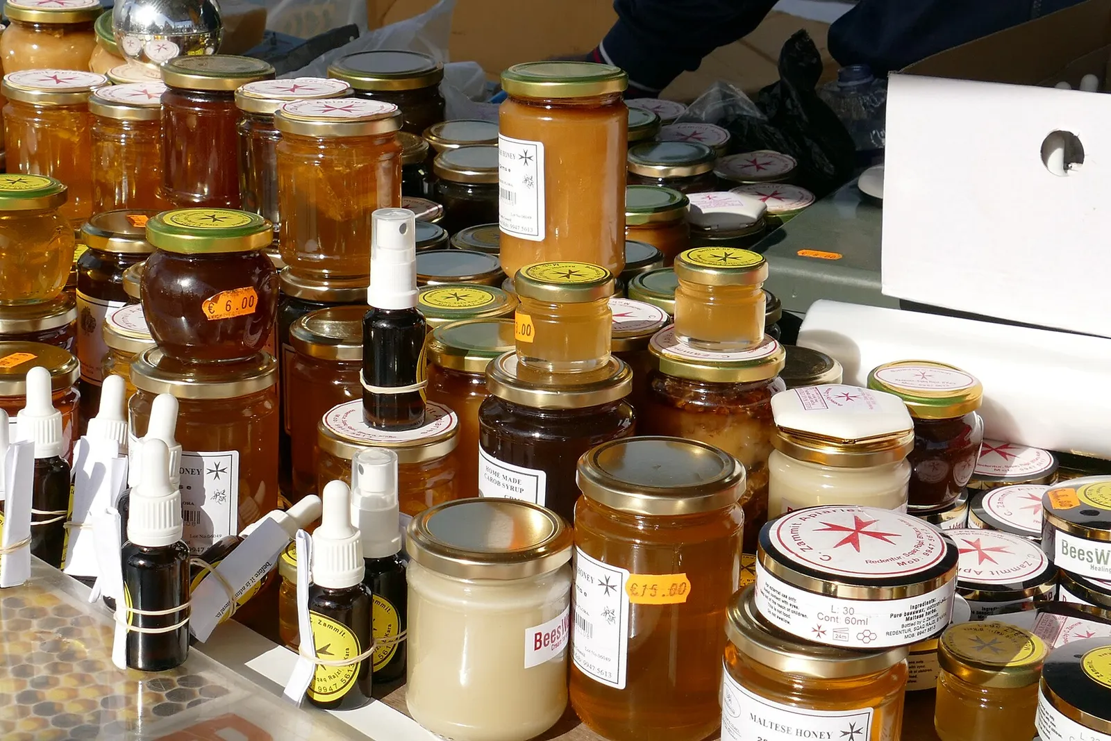 Jars of honey at a market stall