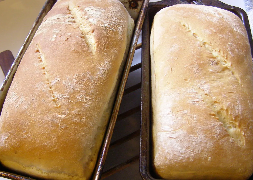 Two golden loaves of bread