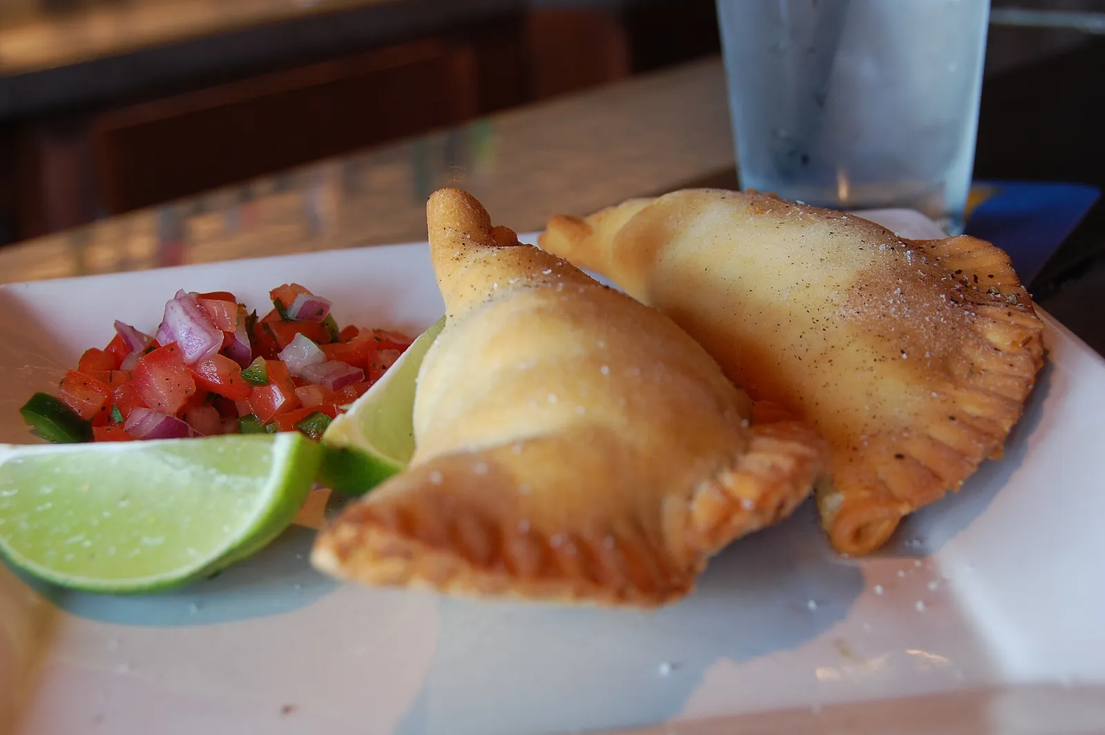 Empanadas with lime and salsa
