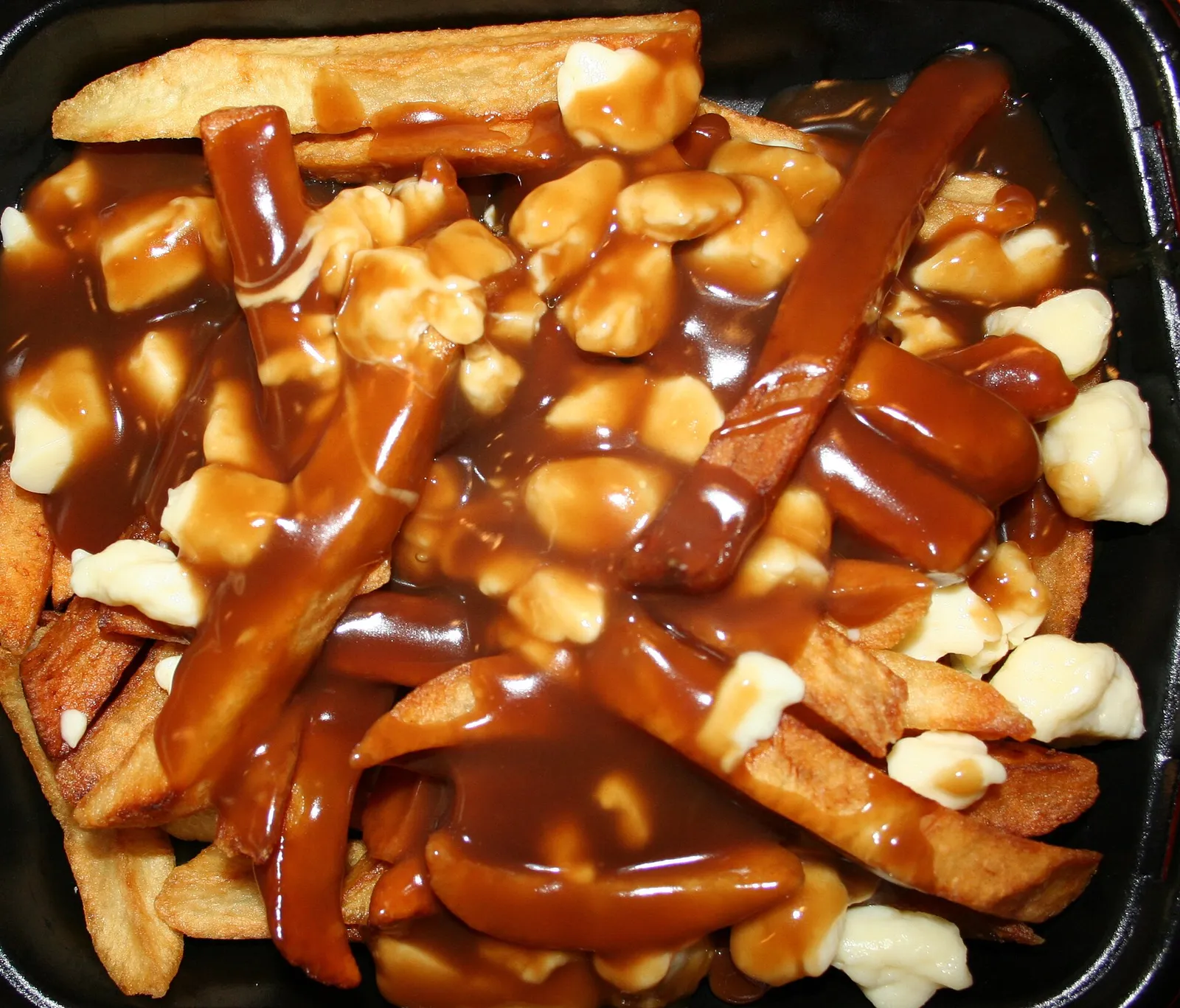 Poutine with gravy and cheese curds