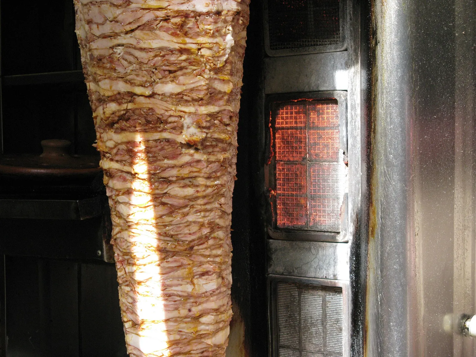 Shawarma meat on a vertical spit